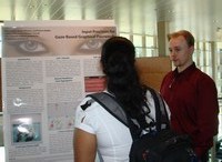 Alain presenting a poster