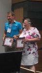 Kosta and Kirstie accept Best Paper award