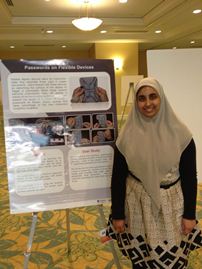 Sana presents her poster at CRA-W