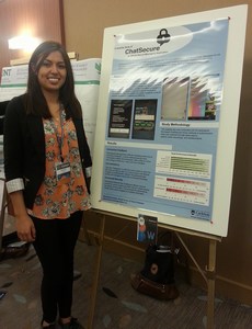 Stephanie and her CRA-W poster