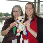 Leah and Sonia posing with the IDC bear in Manchester UK