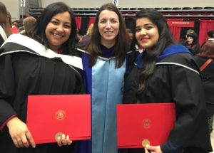 Christine, Sonia, and Kalpana standing together at the Fall 2016 Convocation
