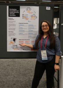 Daniela standing next to her SRC poster at CHI 2018