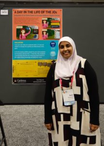 Sana standing next to her SRC poster at CHI 2018