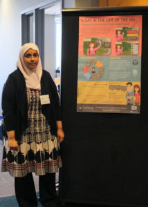 Sana presenting her poster at the CLUE Symposium