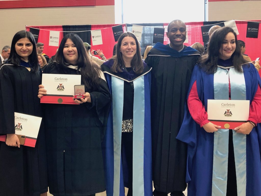 Graduates from the CHORUS lab at the Fall 2019 convocation.  From left to right, Navneet, Jessica, Sonia, Michael, and Reham.